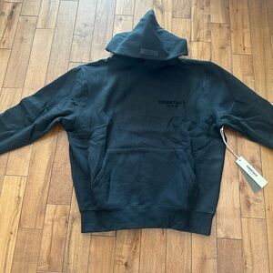 ESSENTIALS Black Pullover Hoodie with Subtle Chest Logo